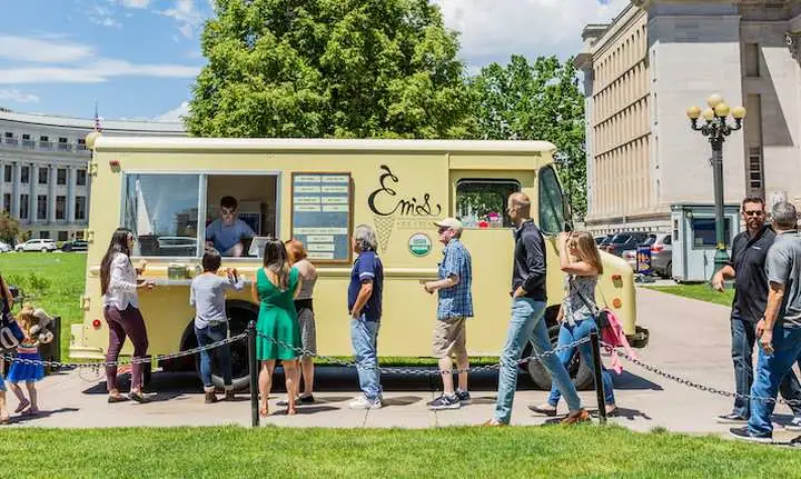 Em's Ice Cream truck at a Denver event with guests in line